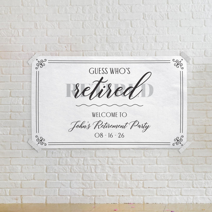Retirement banner mounted on a white brick wall featuring a personalized retirement party welcome message and event date.