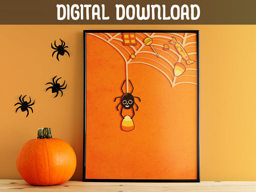 DIGITAL DOWNLOAD:candy crazed spider print in black frame leaning against orange wall surrounded by halloween decor such as spiders and a pumpkin