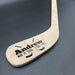 Close-up of the stick blade highlighting crisp UV printed baby name and birth stats on natural birch wood with visible wood grain texture.