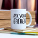 White ceramic mug placed on a desk beside a notebook and pen with a soft coffee shop vibe. The image highlights the mug as a practical daily-use gift.