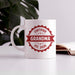 Personalized Grandma ceramic mug displayed on a table with custom EST year.
