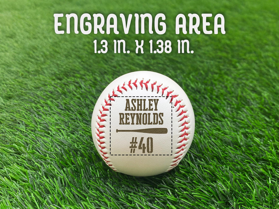 Text reads: Engraving area measures 1.3 inches x 1.38 inches.

An engraved baseball is shown on a green grassy background. This custom ball features a player's first and last name, jersey number, and a baseball bat graphic.