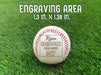 Text reads: Engraving area measures 1.3 inches x 1.38 inches.

A baseball is shown on a green grassy background. The baseball has a player's name, team name, and number engraved into it. This design features stylized text using script and 3D block lettering.