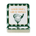 A stack of green and white coaster cards with a golf-themed design and text.
