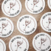 Several personalized espresso martini coasters spread across a tabletop, each featuring the custom bar name, espresso martini glass illustration, and established year.
