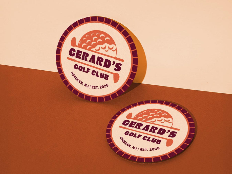 Custom round pulpboard coasters are shown sitting on a tan and orange background. The custom coasters feature design printed with bold golf imagery, striped radial border, and custom text.