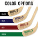 Color options for the personalized hockey stick design, displaying black, blue, red, and green UV printed name and birth info on wooden sticks.