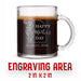 A glass mug with an engraved design on it. The mug is filled with tea, and there is text under the mug that reads "Engraving Area is 2 in x 2 in”