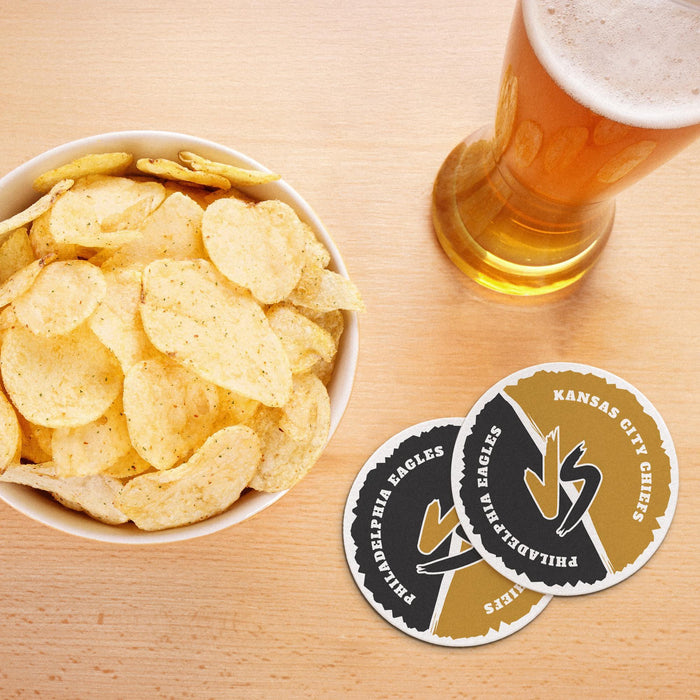 Black and gold House Divided coasters displayed beside chips and a glass of beer for a football watch party.