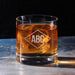Clean hero-style image of the personalized whiskey glass on a marble surface, featuring the diamond initials engraving. The design appears crisp and professionally finished.