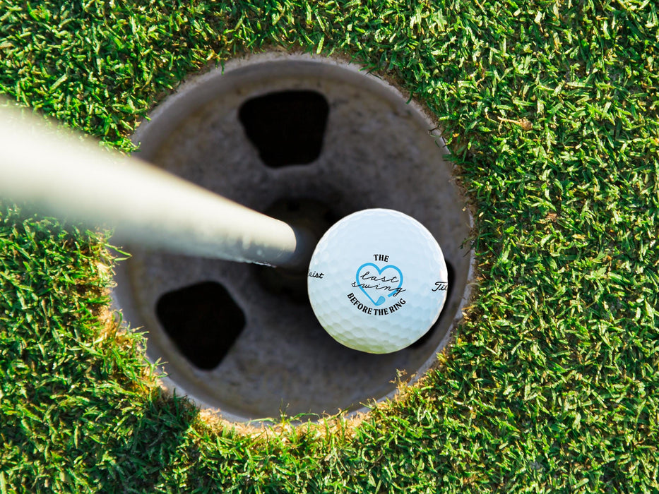 Titleist golf ball shown in a golf course hole.