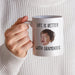 Personalized grandkids photo mug held in hand with “Life Is Better With Grandkids” design.