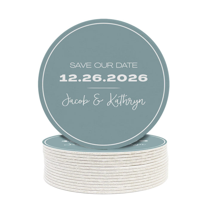 Save the Date wedding coaster featuring a minimalist design with custom names and wedding date. Printed on heavyweight absorbent paper coaster material.