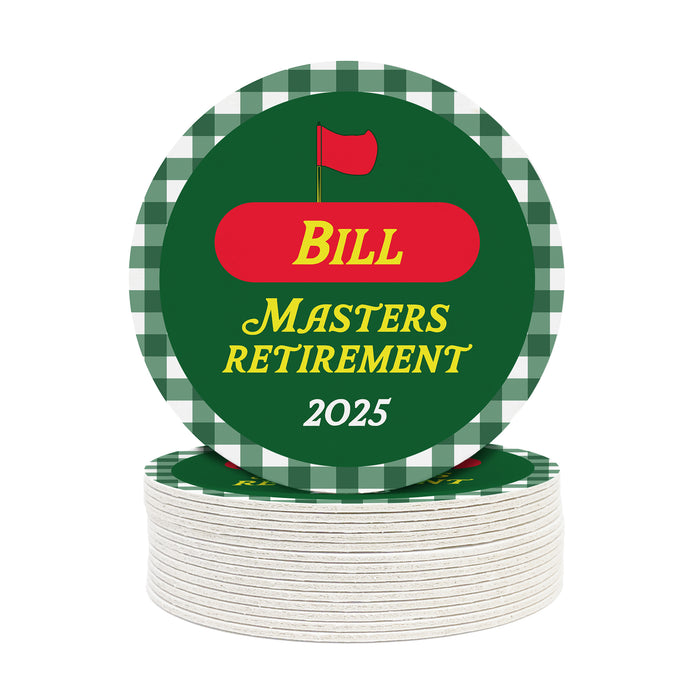 A stack of green and white checkered coasters with a red and yellow label that reads "BILL Masters Retirement 2025".
