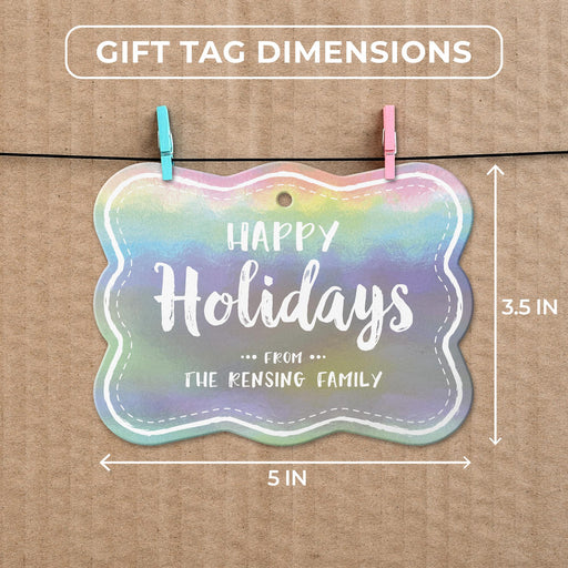 Rounded rectangle Christmas gift tag size guide showing dimensions on kraft paper with colorful mini clothespins.