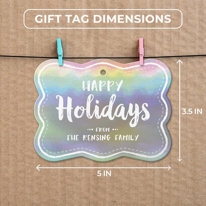 Rounded rectangle Christmas gift tag size guide showing dimensions on kraft paper with colorful mini clothespins.