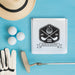 Golf-inspired wedding gift box personalized with couple names and wedding date. Displayed with golf balls and a golf tee.