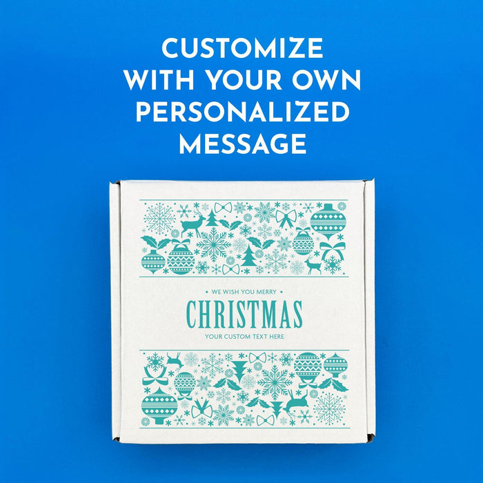 Personalized Christmas golf ball gift box featuring a blue sweater-inspired holiday pattern with a custom short message in the center.