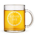 A glass mug filled with a yellow liquid, with an engraved design on it that says "BADASS MOM" and "LOVE. VIOLET".