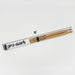 A pair of wooden drumsticks with the brand name "pro-mark" printed on them, lying on a white background.