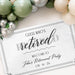 Close-up angled view of the Guess Who's Retired banner showcasing the elegant typography, personalized name, and retirement party date.