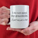 Funny grandparents mug held in hand with “I Do Not Spoil My Grandkids. I just say yes a lot. ” saying.