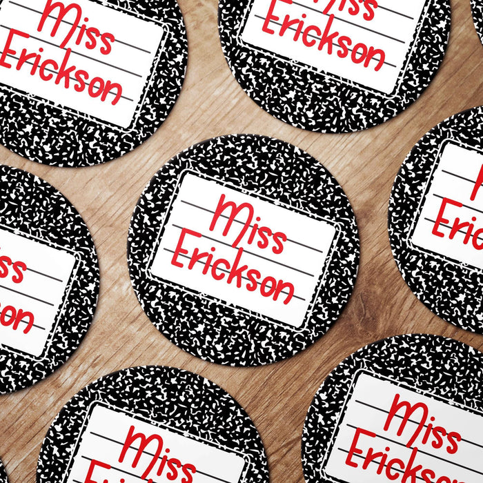 Multiple personalized teacher coasters arranged together, each with custom name on composition notebook design. Highlights repeat order look.