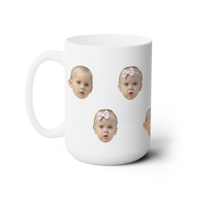 A white ceramic mug with a collage of four baby faces superimposed on it, each face with a bow.