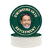 A stack of green and white coaster-like objects with a photo of a smiling man's face on them.