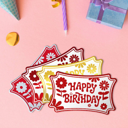 Four Birthday rectangle tags in metallic red, metallic gold, glitter white, and glitter red.