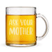 Front-facing product image of the engraved glass mug against a clean background with bright tea inside. A clear product-focused image highlighting the bold design.