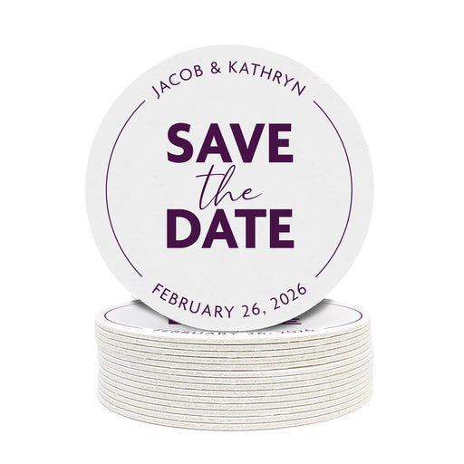 Save the Date wedding coaster featuring a modern script and bold text design with custom names and wedding date. Printed on heavyweight absorbent paper coaster material.