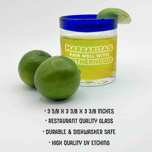 A Margarita glass with a lime wedge and a description of the glass's features.