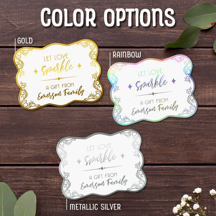 Close-up of the “Let Love Sparkle” wedding gift tag design available in Gold, Rainbow, and Metallic Silver foil finishes. Personalized cardstock tags feature decorative flourishes and custom sender names.