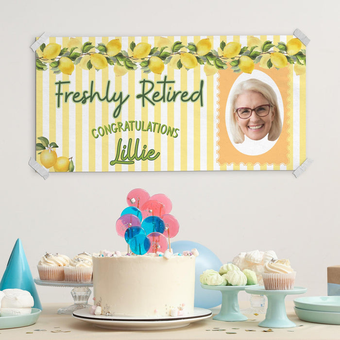 Freshly Retired banner displayed above a party table with cake and decorations. Personalized photo banner designed for retirement parties and celebrations.
