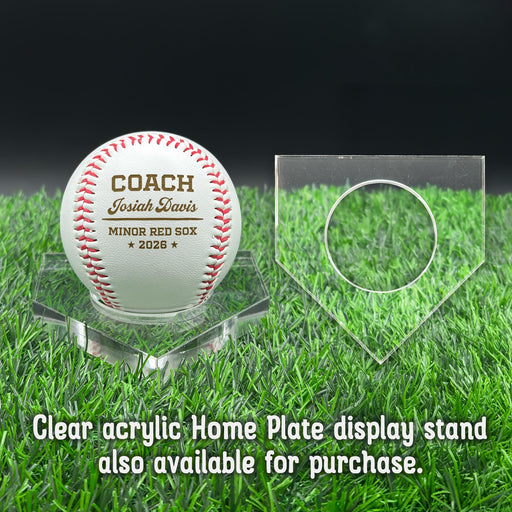 A personalized baseball with red stitching is placed on a clear acrylic stand, accompanied by a text overlay that reads Clear acrylic Home Plate display stand also available for purchase.