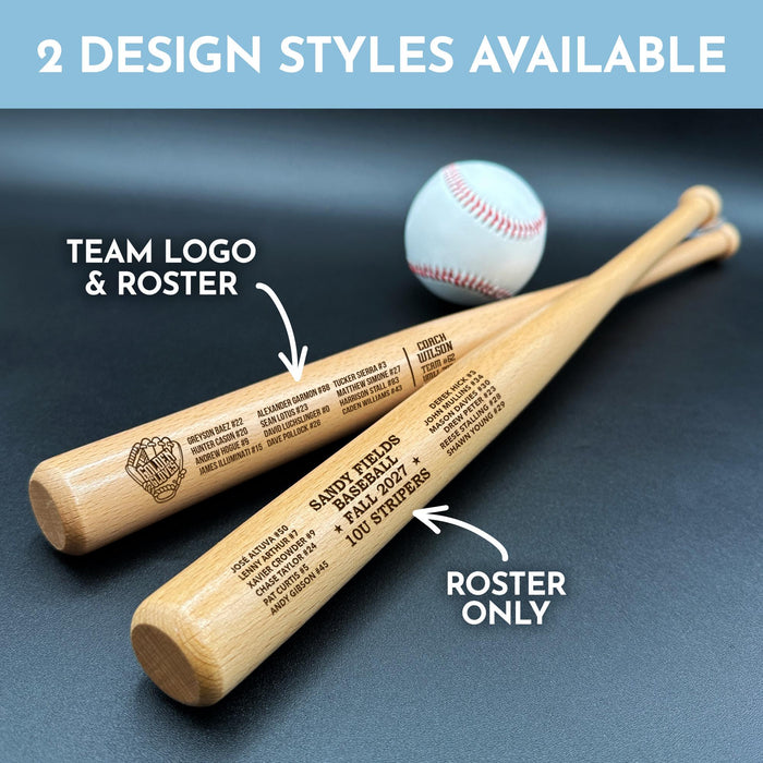 Two personalized mini baseball bats with 2 different design styles engraved on them, placed on a black surface next to a baseball. The two design styles shown are Team Logo & Roster and Roster Only.