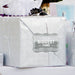 Silver gift bag decorated with a personalized “Your Biggest Fans” foil wedding gift tag attached with ribbon. The metallic design creates a modern and elegant presentation for wedding gifts.