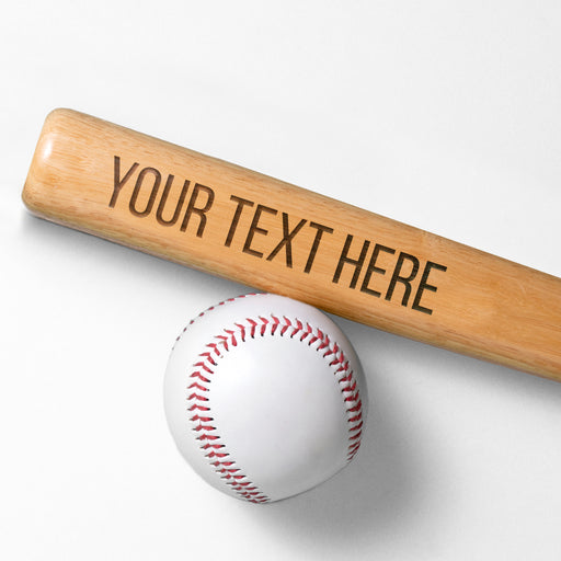 a mini baseball bat with custom text and a baseball on a white surface