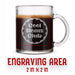 A glass mug with an engraved design on it. The mug is filled with tea, and there is text under the mug that reads "Engraving Area is 2 in x 2 in”