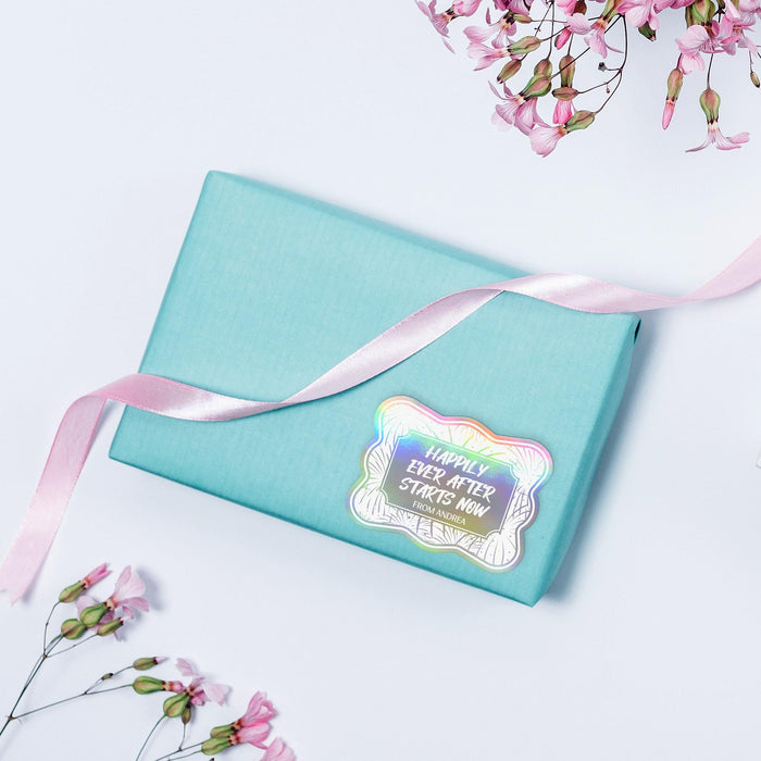 Personalized gold foil wedding gift tag attached to decorative wedding welcome bags and wrapped gifts. The styled image showcases how the tag can be used for weddings, bridal showers, or special events.