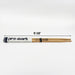 A packaged set of drumsticks sit on a white surface. The drumsticks are 15 3/8 inches in length.