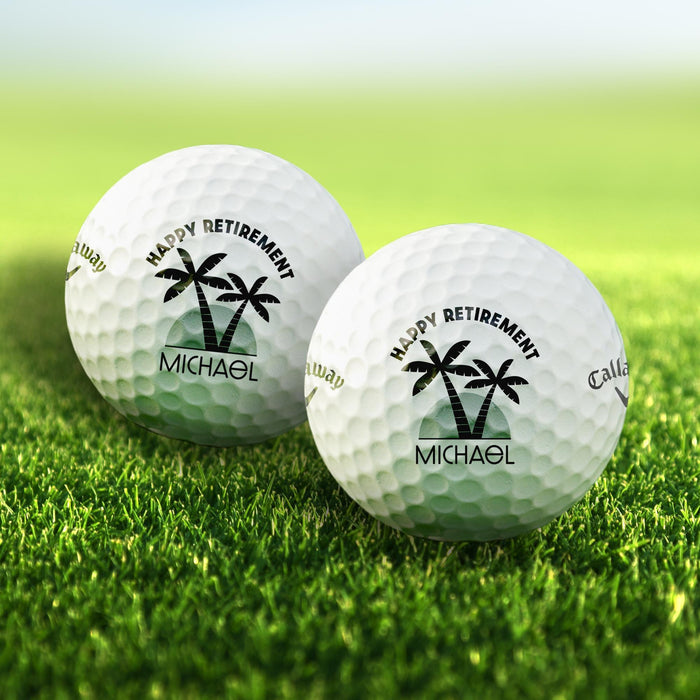 Set of personalized golf balls featuring the Happy Retirement with palm trees design. Customized with a name for a unique retirement gift.