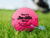 Name standards for designs shown with arrow pointing to names. Design is seen on a pink Callaway golf ball on a golf course.