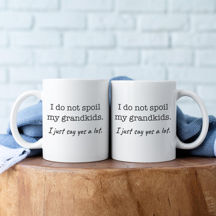 Two funny grandparents mugs displayed together with matching grandkids quote design.