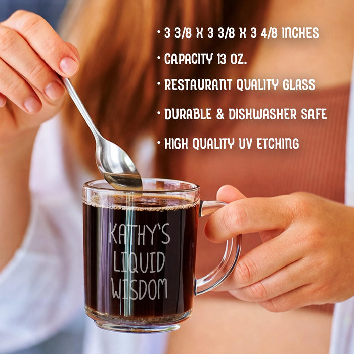 A person is holding a glass mug with a message engraved on it. The image is accompanied by a text overlay that reads • 3 3/8 x 3 3/8 x 3 4/8 inches • Capacity 13 oz. • restaurant quality glass • durable & dishwasher safe • high quality uv etching