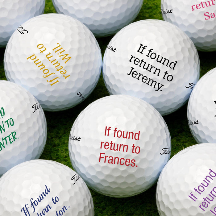 Multiple white custom text golf balls are shown printed with different texts and colors.