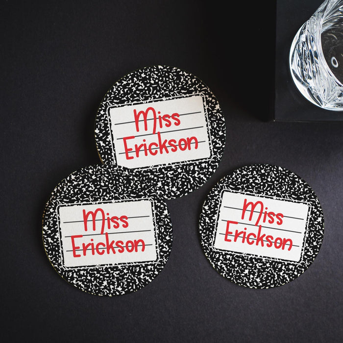 Multiple coasters displayed on a dark background. Emphasizes contrast and design visibility.