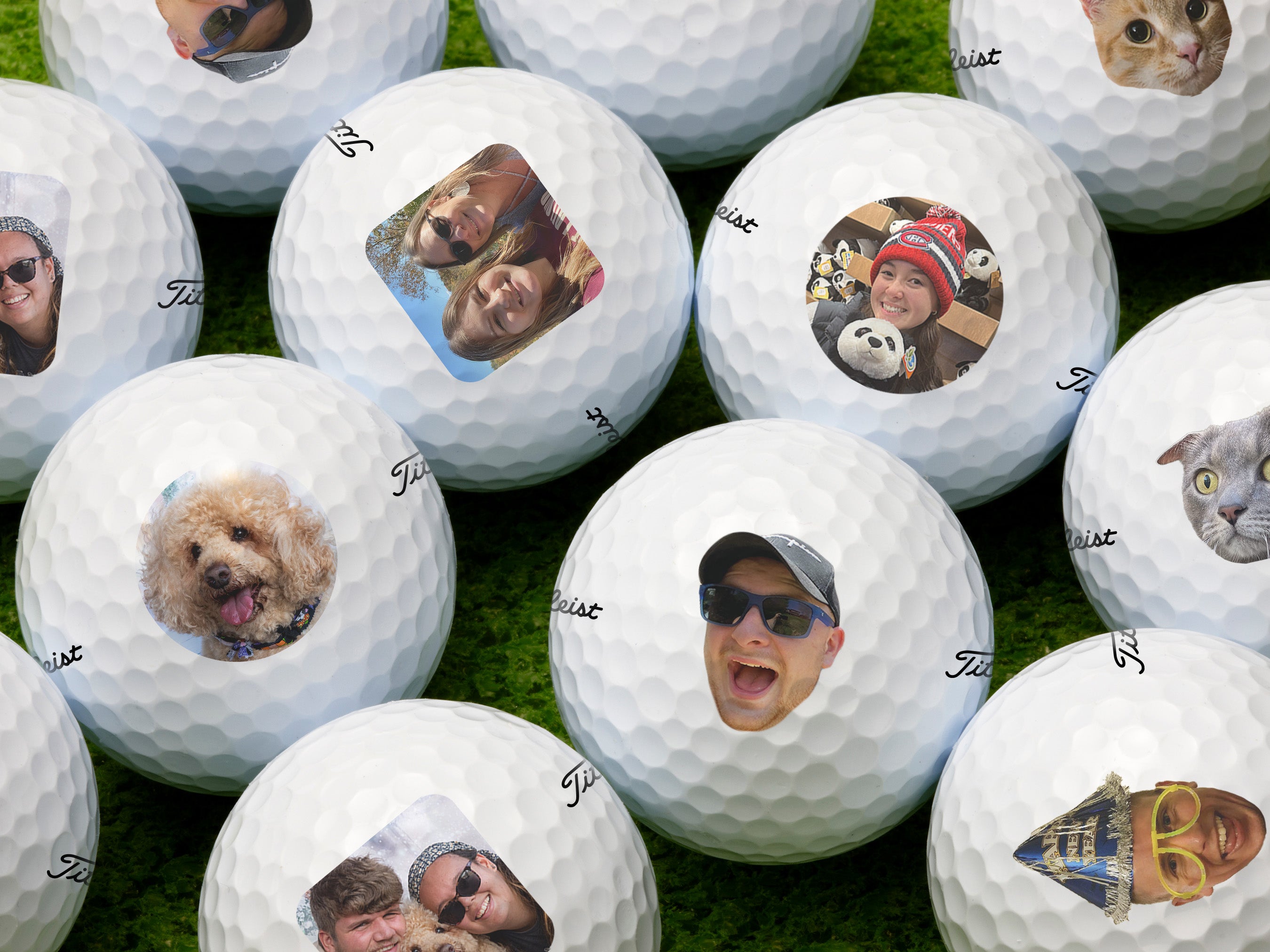 single white titles golf ball with cut out photo face on it against a grass golf course background