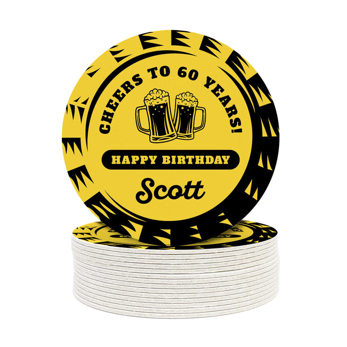 A single coaster is shown on top of a stack of coasters against a white background. Coasters say Cheers to 60 Years! Happy Birthday Scott.